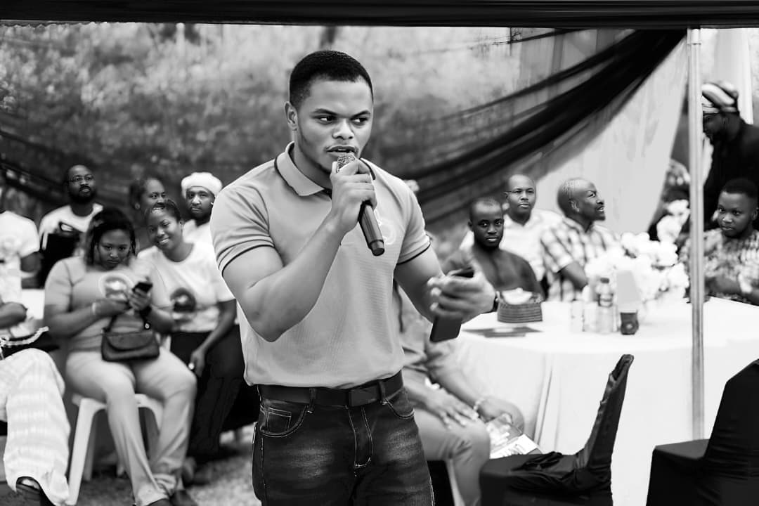 Jethro Mark Da'ar speaking into a microphone
